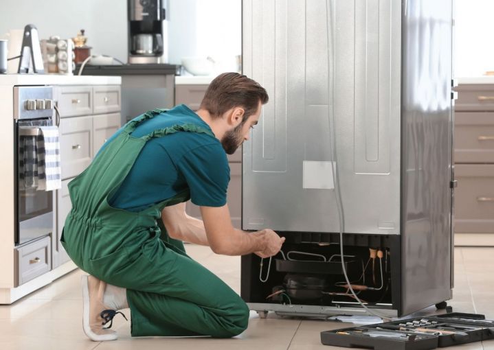 white refrigerator in minimal kitchen